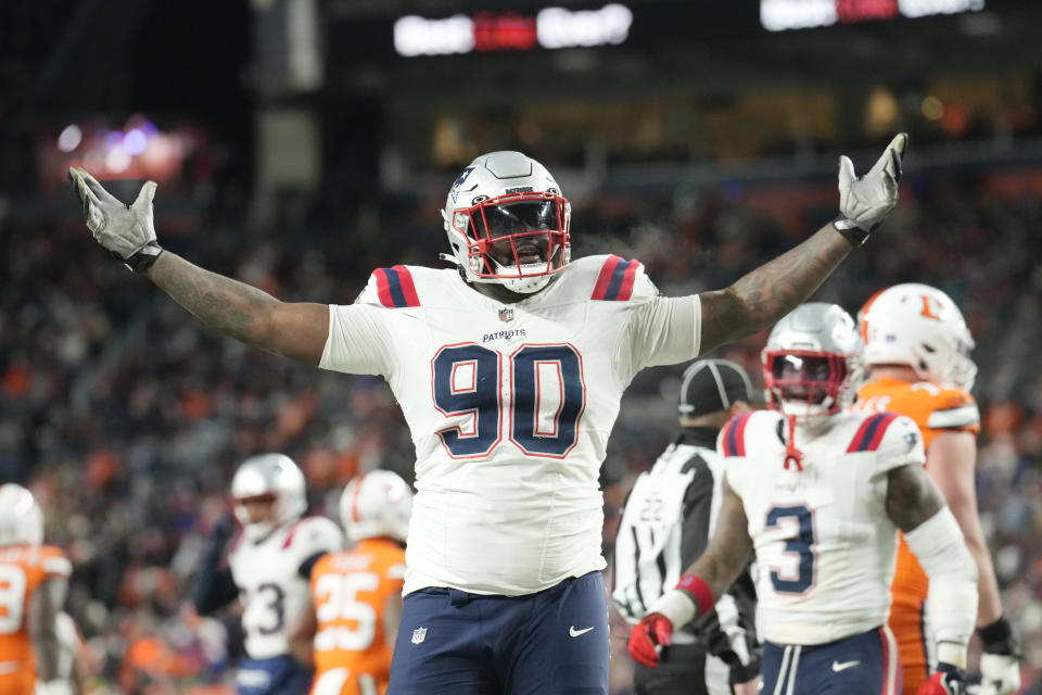 FILE - New England Patriots defensive tackle Christian Barmore (90) reacts after a play during the second half of an NFL football game against the Denver Broncos, Sunday, Dec. 24, 2023, in Denver. New England Patriots defensive tackle Christian Barmore has agreed to a four-year contract extension worth up to $92 million, according to a person with knowledge of the deal. The person confirmed the deal to The Associated Press on the condition of anonymity on Monday, April 29, 2024, because it has not been announced.(AP Photo/David Zalubowski, File)