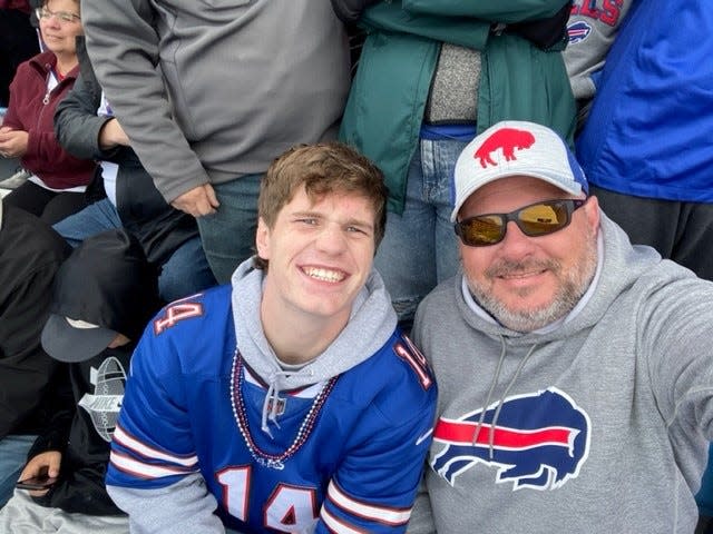 Jamie Schneider (right) and his son James at the Buffalo Bills matchup with the Pittsburgh Steelers on Oct. 9, 2022.