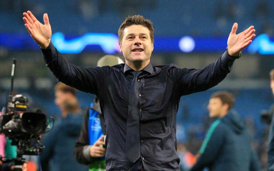 Tottenham Hotspur manager Mauricio Pochettino celebrates in front of the visiting fans after the final whistle - Getty Images/David Blunsden