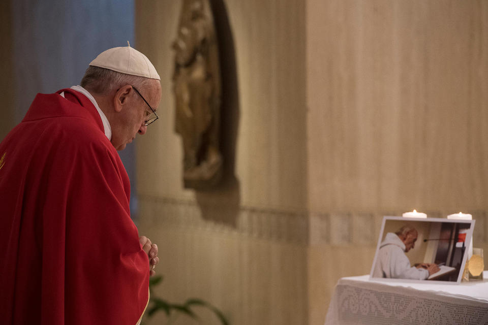 Pope Francis prays