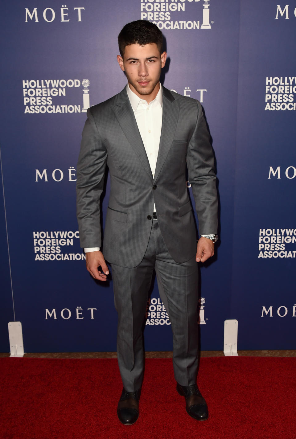 Nick Jonas arrives at the Hollywood Foreign Press Association's Grants Banquet at the Beverly Hilton hotel on Thursday, Aug. 14, 2014, in Beverly Hills, Calif. (Photo by Jordan Strauss/Invision/AP)