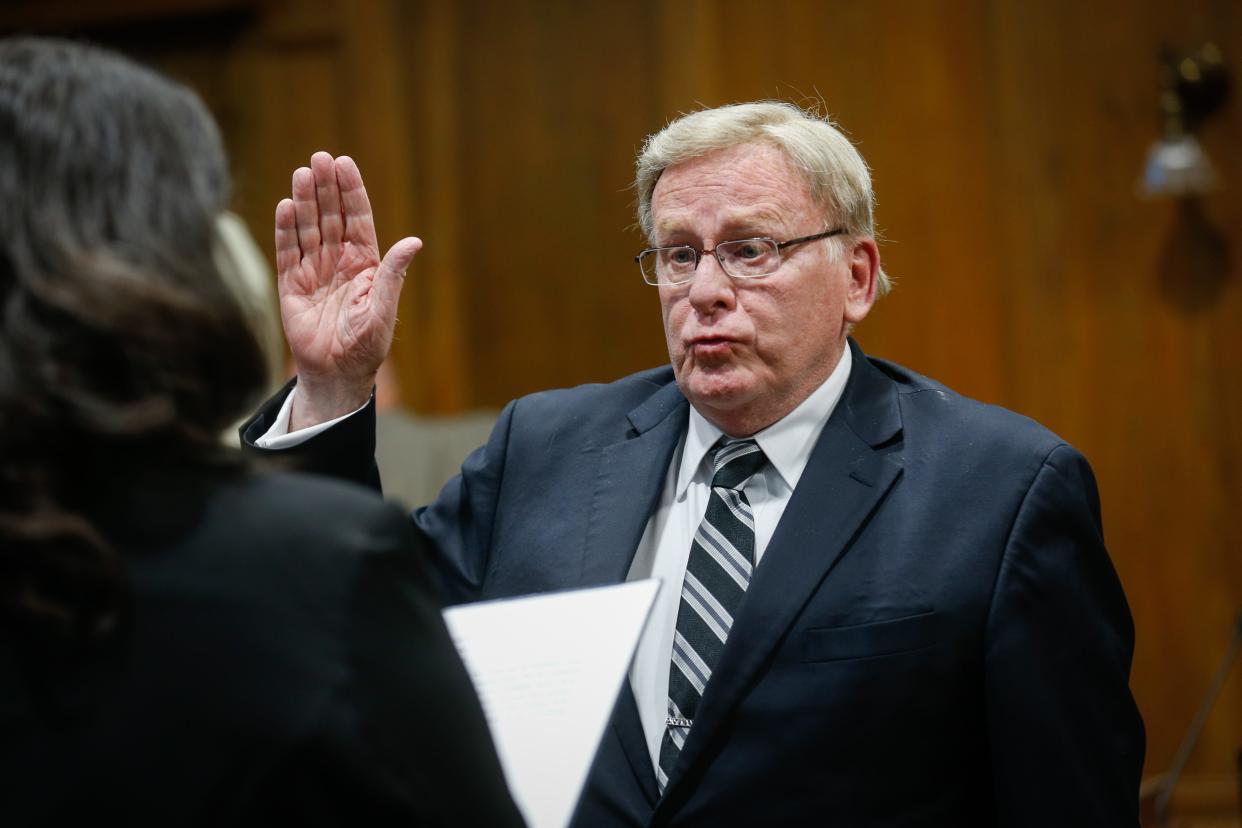 Springfield Mayor Ken McClure is sworn into office during the Springfield City Council meeting on Monday, April 17, 2023.