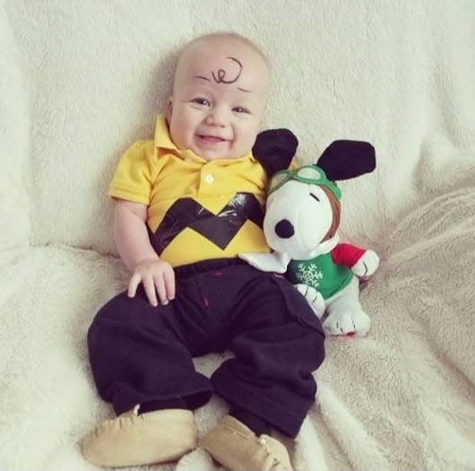 Shannon Van Lankvelt of Neenah dressed her infant son as Charlie Brown one Halloween. All it took was a Snoopy stuffed animal, eyeliner and a yellow polo with black tape.