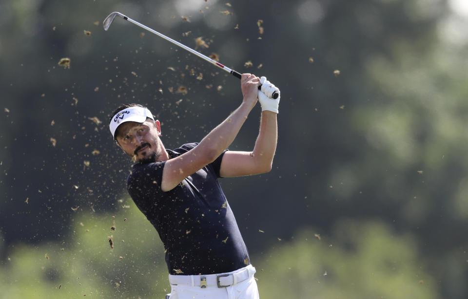 Mike Lorenzo-Vera of France plays a shot on the 3rd hole during the second round of the DP World Tour Championship golf tournament in Dubai, United Arab Emirates, Friday, Nov. 22, 2019. (AP Photo/Kamran Jebreili)