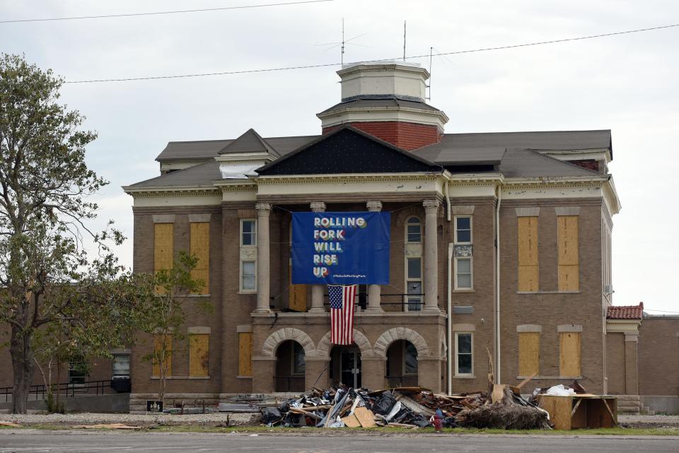 A banner showing the spirit of the people of Rolling Fork hangs on the boarded-up Sharkey County Courthouse Wednesday, April 26, 2023. Just over a month ago, Rolling Fork was hit by an EF-4 tornado, devastating the small south Delta town. Recovery continues.