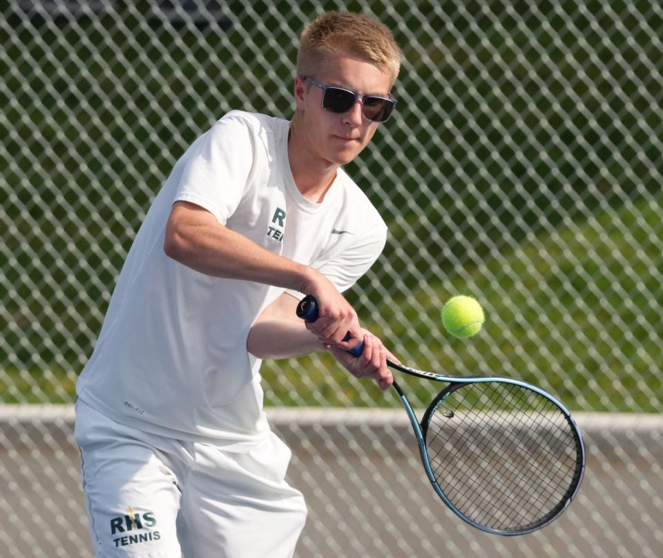 Palmer Johnson of Aberdeen Roncalli hits a backhand shot during the opening day of the state Class A high school boys tennis tournament on Monday, May 13, 2024 at Rapid City.