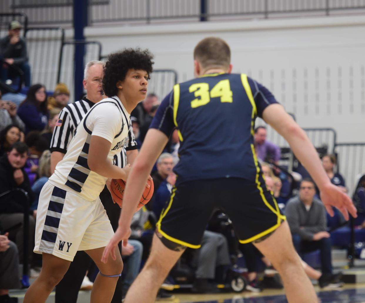 West York senior guard Mark Walker looks to pass around Eastern York's Carter Wamsley during a game on Friday, Jan. 26, 2024. West York won, 47-44, to remain tied with York Suburban for first place in YAIAA Division II.