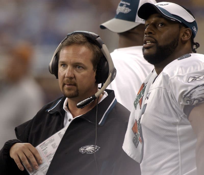 Eagles assistant coach Mornhinweg and quarterback McNabb during game against Lions.