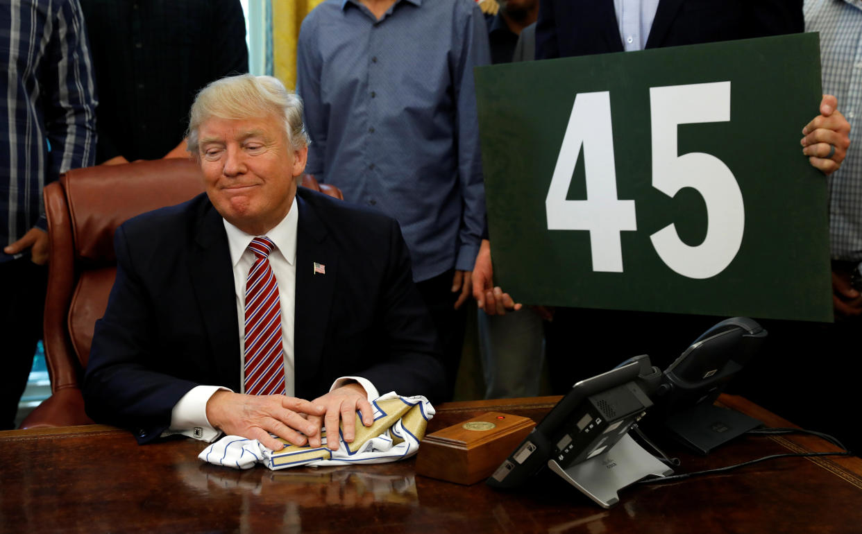 While honoring members of baseball's 2016 World Series champion Chicago Cubs, President Donald Trump on Wednesday makes remarks about health care at the White House. (Photo: Kevin Lamarque / Reuters)