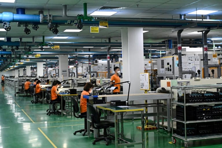Vietnam, a global manufacturing hub, is targeting growth of between six and 6.5 percent this year (Nhac NGUYEN)