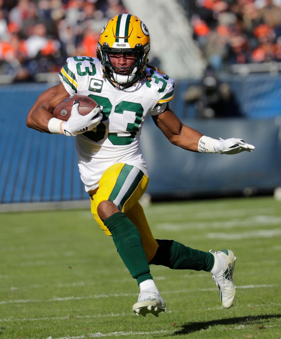 Green Bay Packers running back Aaron Jones runs against the Chicago Bears on Dec, 4 at Soldier Field in Chicago.
