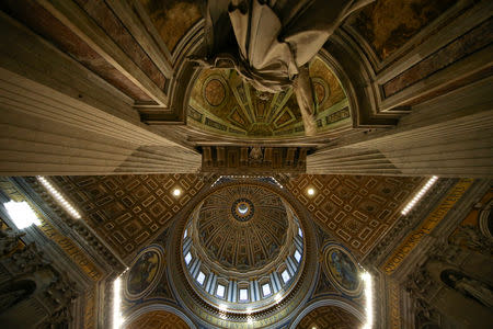 The dome of Saint Peter's Basilica is seen during the Epiphany mass led by Pope Francis at the Vatican January 6, 2017. REUTERS/ Stefano Rellandini