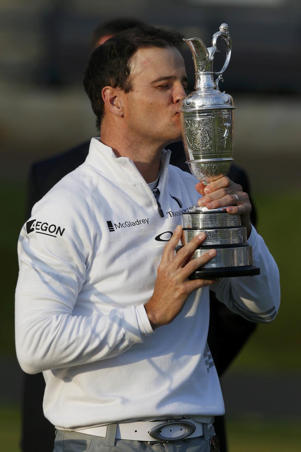 Zach Johnson of the U.S. celebrates as he kisses the Claret Jug after winning the British Open golf championship on the Old Course in St. Andrews, Scotland, July 20, 2015. REUTERS/Russell Cheyne