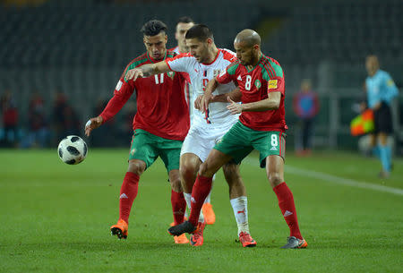 Soccer Football - International Friendly - Serbia vs Morocco - Stadio Olimpico Grande Torino, Turin, Italy - March 23, 2018 Serbia's Aleksandar Mitrovic in action with Morocco's Karim El Ahmadi and Nabil Dirar REUTERS/Massimo Pinca