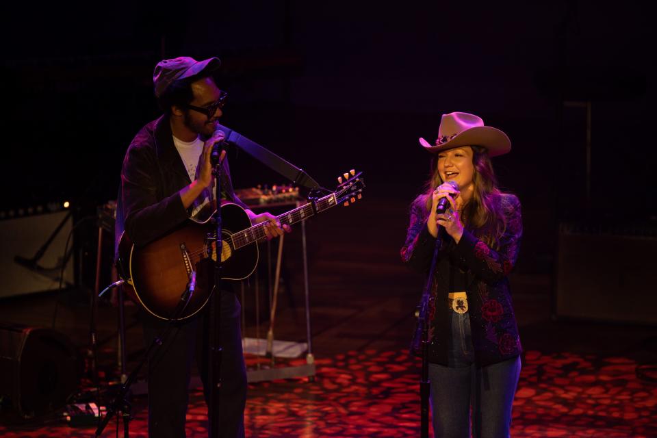 Tre Burt, left, and Kelsey Waldon perform during the You Got Gold event to honor the legacy of singer/songwriter John Prine at Ryman Auditorium in Nashville, Tenn., Tuesday, Oct. 10, 2023.