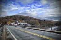 <p>Situated about two and a half hours northwest of New York City in the Catskill Mountains, Callicoon is a tiny town perfect for a weekend escape with a good car. You'll have to get off I-84 about 50 miles from town, and the remainder of the trip will be on winding, sometimes hilly state roads. The picturesque downtown is only a few blocks long, but there's a wine merchant, a brew pub, and a handful of locally owned restaurants to keep you occupied.<br></p><p>Best of all, Callicoon is only 23 miles away from Monticello, New York, and the <a href="https://www.caranddriver.com/news/a15150867/grandee-grand-prix-car-news/" rel="nofollow noopener" target="_blank" data-ylk="slk:Monticello Motor Club;elm:context_link;itc:0;sec:content-canvas" class="link ">Monticello Motor Club</a>, which features a 4.1-mile paved course with five configurations and an off-road course. Members have access to the track most weekends from April to November, but nonmembers can sign up for a three-day performance driving school or a three-hour off-road excursion.</p>