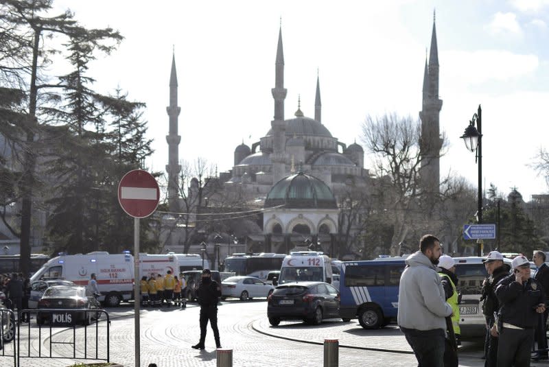Turkish police stand guard as forensic experts inspect the site of a blast in the Blue Mosque area in Istanbul's tourist hub of Sultanahmet, Turkey on January 12, 2016. File Photo by Ali Turkel/UPI