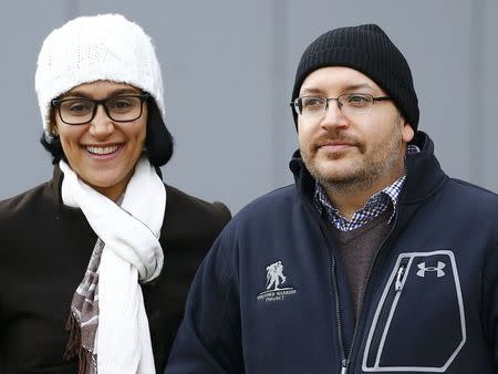 Jason Rezaian, Washington Post reporter and one of the U.S. citizens recently released from detention in Iran, poses to media together with his wife Yeganeh Salehi outside the Emergency Room of the Landstuhl Regional Medical Center (LRMC) in the southwestern town of Landstuhl, Germany, January 20, 2016.REUTERS/Kai Pfaffenbach