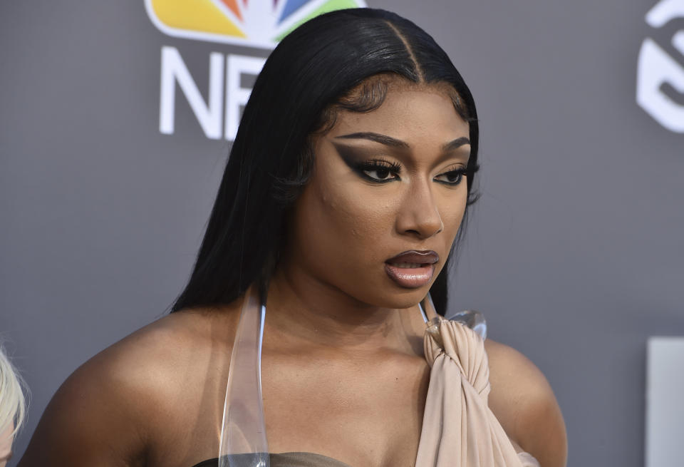 FILE - Megan Thee Stallion arrives at the Billboard Music Awards on May 15, 2022, at the MGM Grand Garden Arena in Las Vegas. Megan Thee Stallion is a three-time Grammy winner, hip-hop superstar and entertainer, but none of those things are enough to shield the 27-year-old from widespread misinformation campaigns and social media vitriol since a 2020 shooting involving rapper Tory Lanez. (Photo by Jordan Strauss/Invision/AP, File)