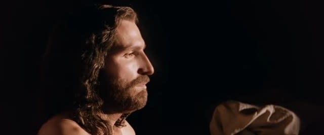 Jesus Christ standing in a cave in "The Passion of the Christ"