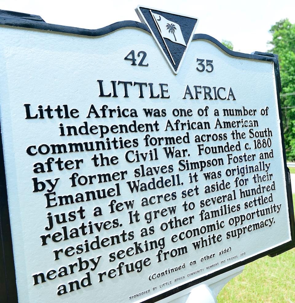 Residents, friends and relatives celebrated the unveiling of a new welcome sign for Little Africa along Highway 9 in northern Spartanburg County, Saturday. After the event a party was held to mark the event.