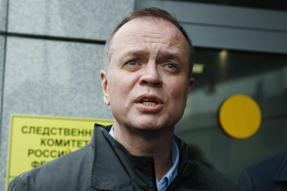 Russian lawyer Ivan Pavlov, center, speaks to media next to the entrance of Russia's Investigative Committee in Moscow, Russia, Friday, April 30, 2021. A lawyer representing the anti-corruption foundation of imprisoned Russian opposition leader Alexei Navalny has been detained in Moscow, his colleague said on social media. St. Petersburg-based lawyer Ivan Pavlov has been representing Navalny’s Foundation for Fighting Corruption after authorities filed a lawsuit to ban the foundation and the politician’s network of regional offices as extremist organizations. (AP Photo/Alexander Zemlianichenko)