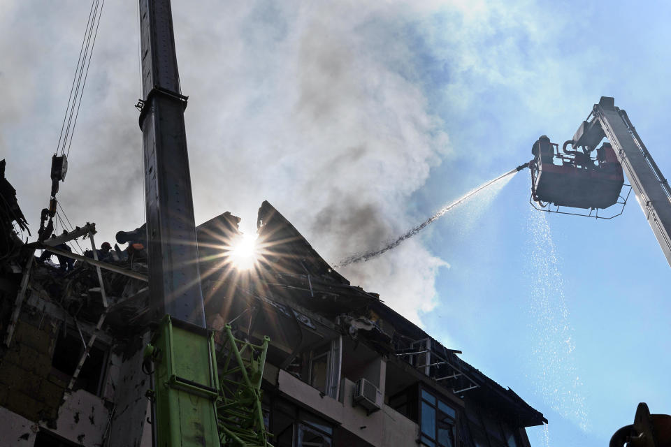 Rescuers respond to a Russian missile strike that hit an apartment building in the Shevchenkivskyi district of Kyiv, Ukraine, June 26, 2022. / Credit: Pavlo Bagmut/Ukrinform/Future Publishing/Getty