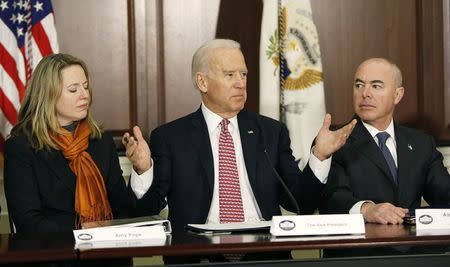 United States Vice President Joe Biden (C) delivers remarks while attending a roundtable on countering violent extremism at the White House in Washington February 17, 2015. REUTERS/Gary Cameron