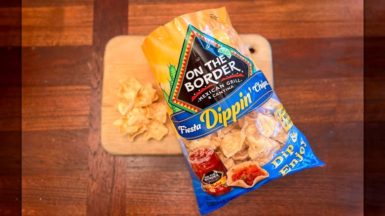 Bag of On the Border scoop-shaped tortilla chips 