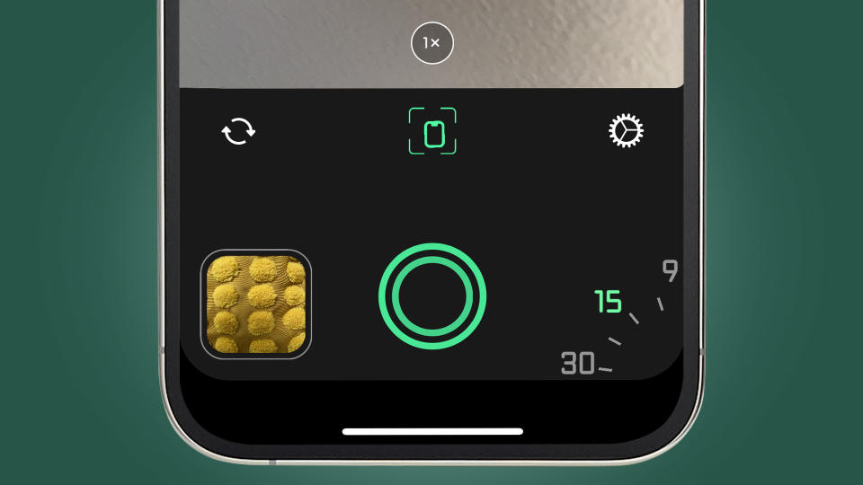 An iPhone on a green background showing the long exposure controls in the Spectre app
