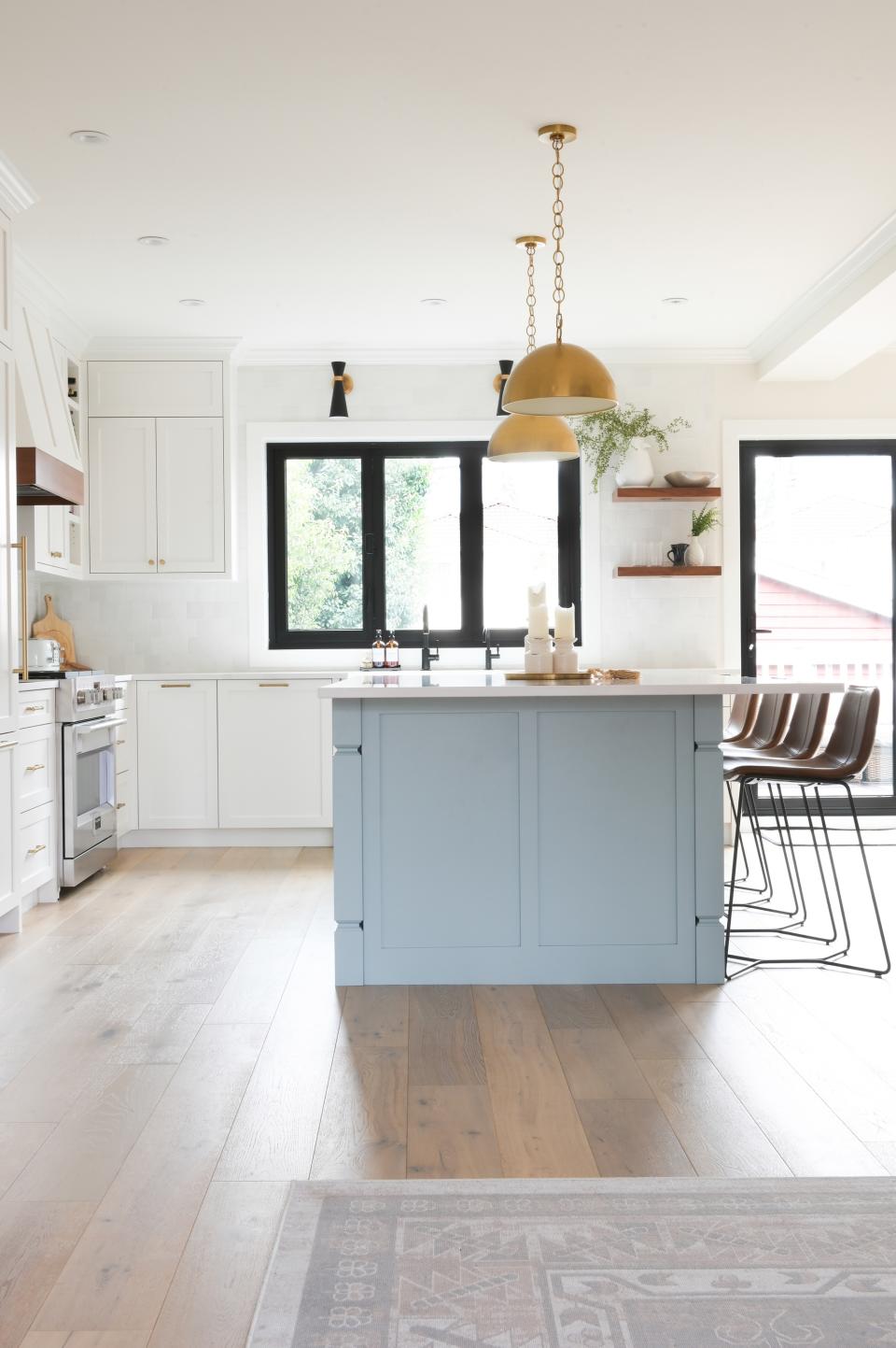 A kitchen with white oak flooring