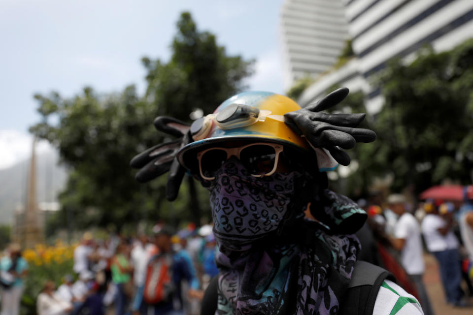 Opposition supporters rally against President Nicolas Maduro in Caracas