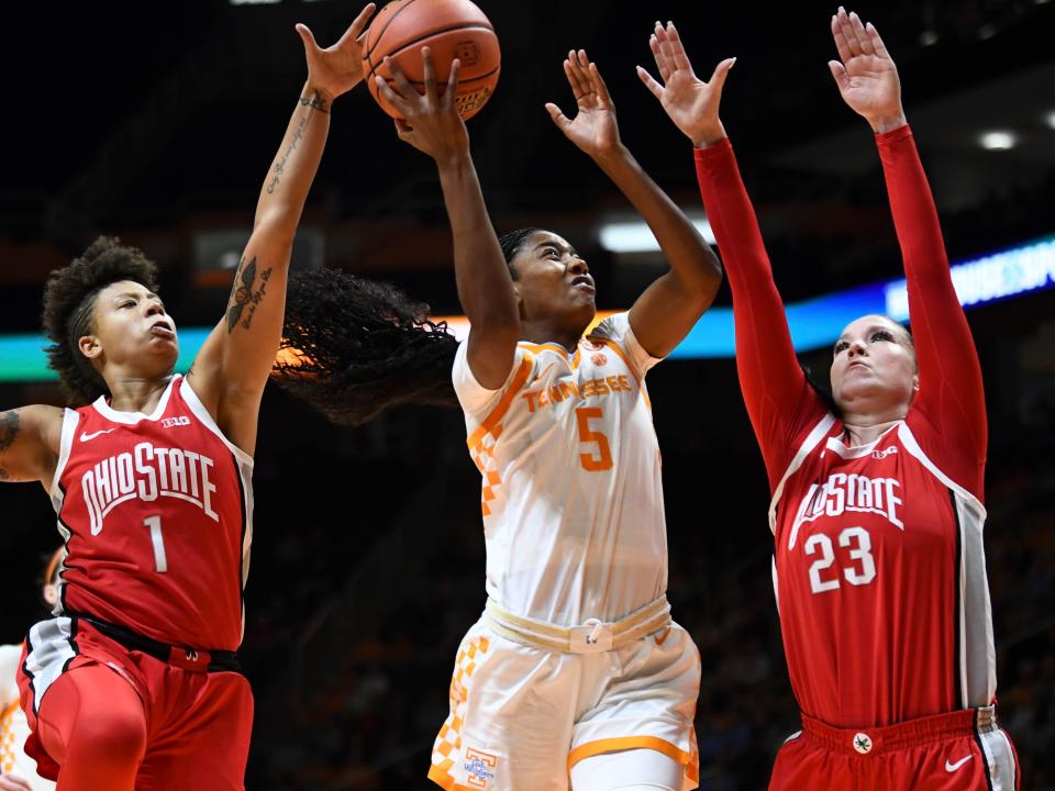 Tennessee's Kaiya Wynn tries to score while guarded by Ohio State's Rikki Harris (1) and Rebeka Mikulasikova on Sunday.