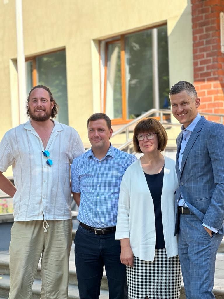 Jakob von Rosen, Mayor Jānis Rozenbergs, castle curator Rudite Vasile and von Rosen's attorney Armands Rasa stand in front of the Lielstraupe castle in Cesis, Latvia. 