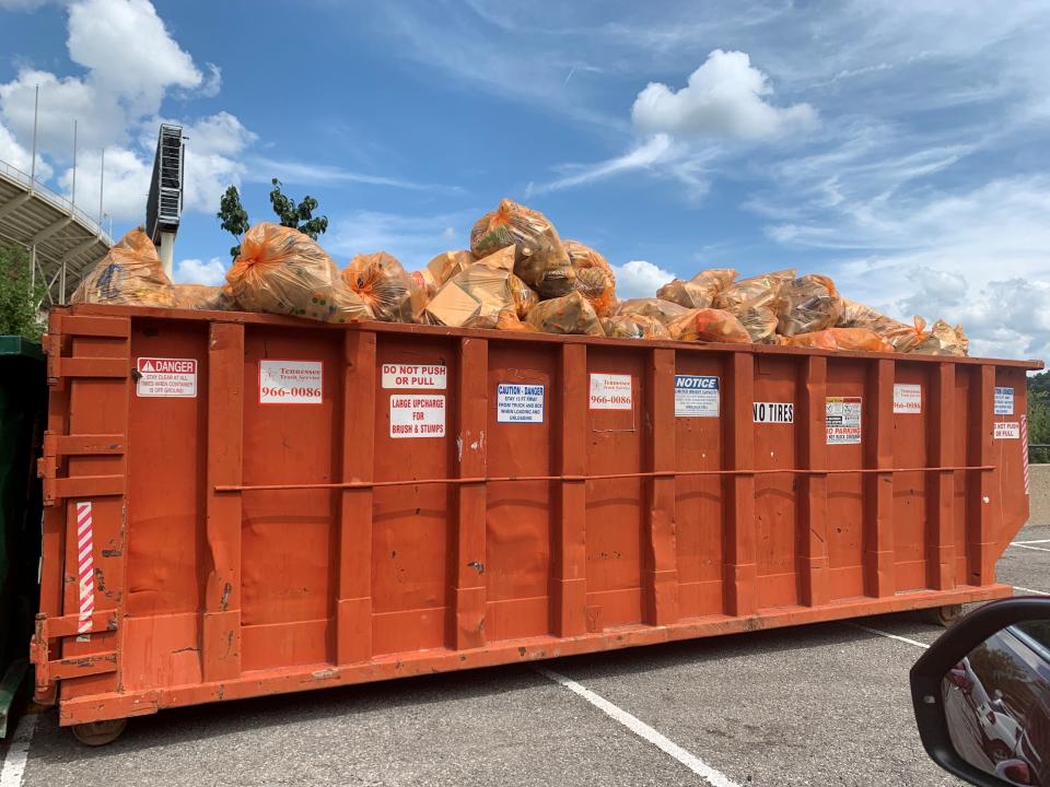 Collected recyclable material sits outside of Neyland Stadium. Plastic waste from Neyland Stadium will be recycled using molecular recycling technology to create special water bottles.
