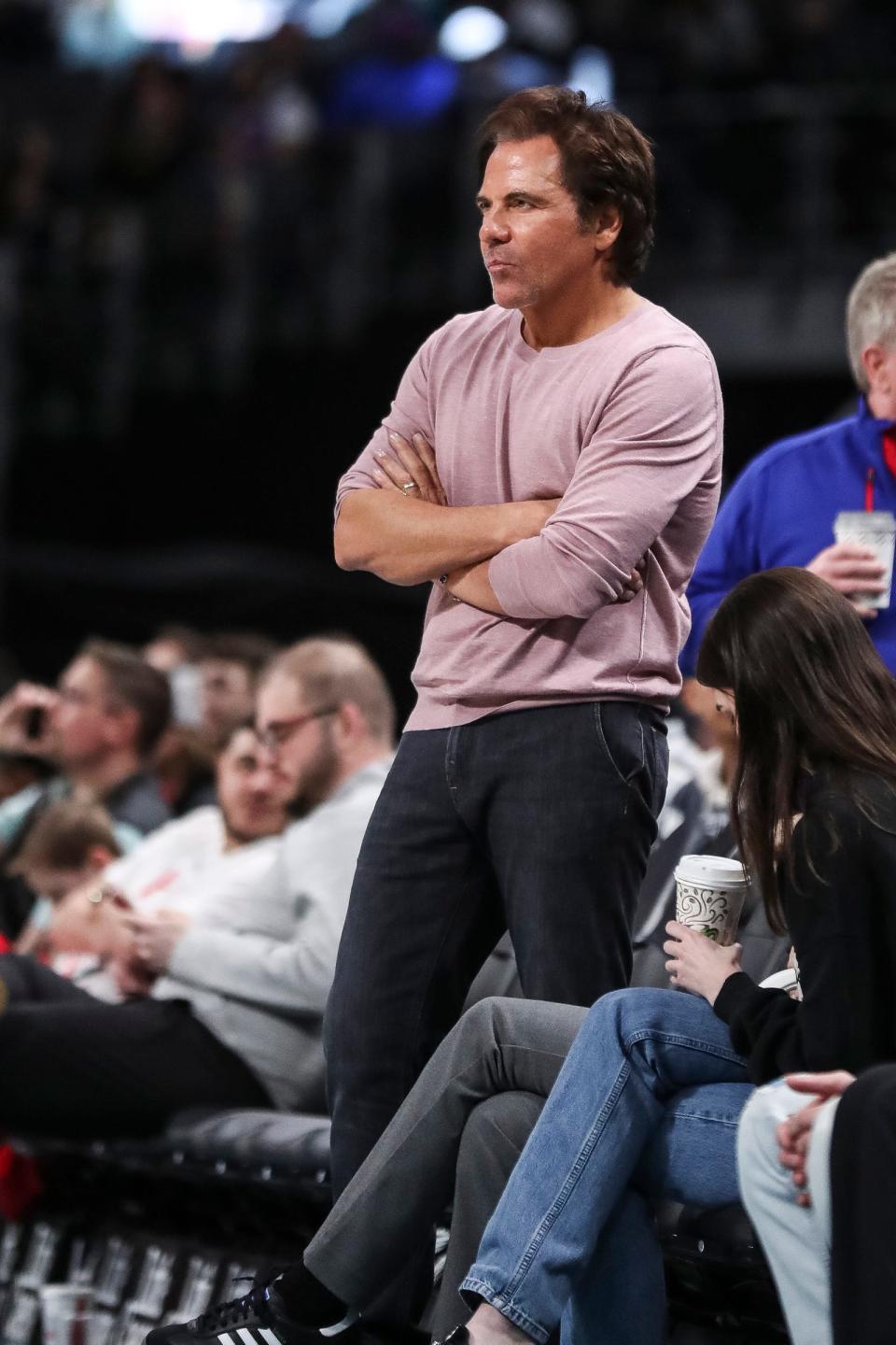 Pistons owner Tom Gores watches the team at a timeout during the second half against the Brooklyn Nets at Little Caesars Arena in Detroit on Wednesday,  April 5, 2023.