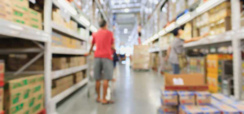 Shopper in a generic retail warehouse store.