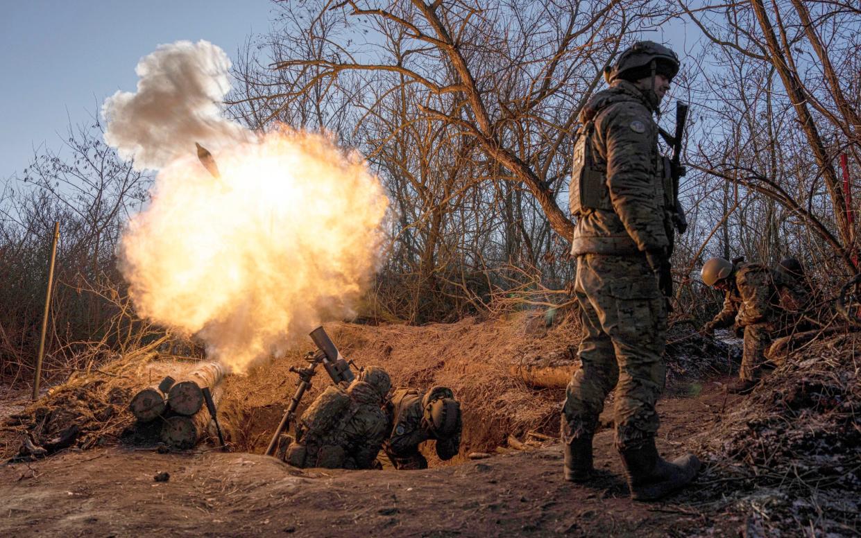 Ukrainian servicemen - AP Photo/Evgeniy Maloletka