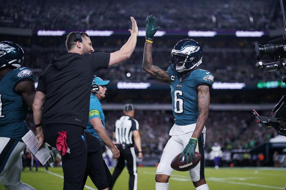 Philadelphia Eagles wide receiver DeVonta Smith (6) high fives Eagles head coach Nick Sirianni during the second half of an NFL football game against the Minnesota Vikings on Thursday, Sept. 14, 2023, in Philadelphia. (AP Photo/Matt Slocum)