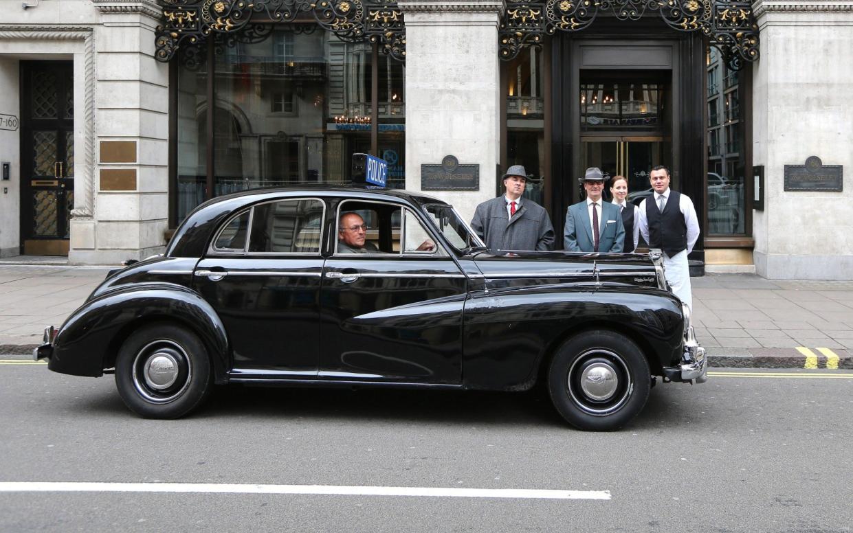 Andrew Roberts and Paul Hudson arrive at the Wolseley in a Wolseley - Philip Hollis