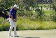 Lee Westwood, of England, reacts as a birdie putt on the second green comes up short of the cup during the final round of the Arnold Palmer Invitational golf tournament Sunday, March 7, 2021, in Orlando, Fla. (AP Photo/John Raoux)