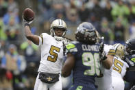New Orleans Saints quarterback Teddy Bridgewater (5) throws against the Seattle Seahawks during the first half of an NFL football game Sunday, Sept. 22, 2019, in Seattle. (AP Photo/Scott Eklund)
