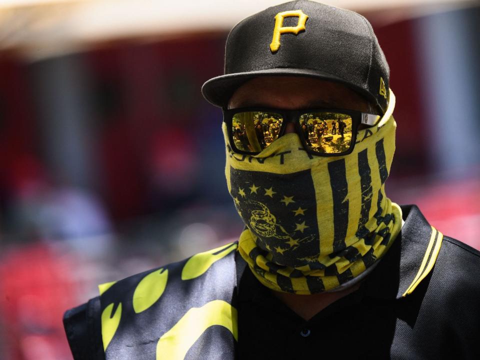 A counter-protester wearing the yellow and black colors and insignia of the Proud Boys outside the National Rifle Association annual meeting in Houston, Texas on May 28, 2022.