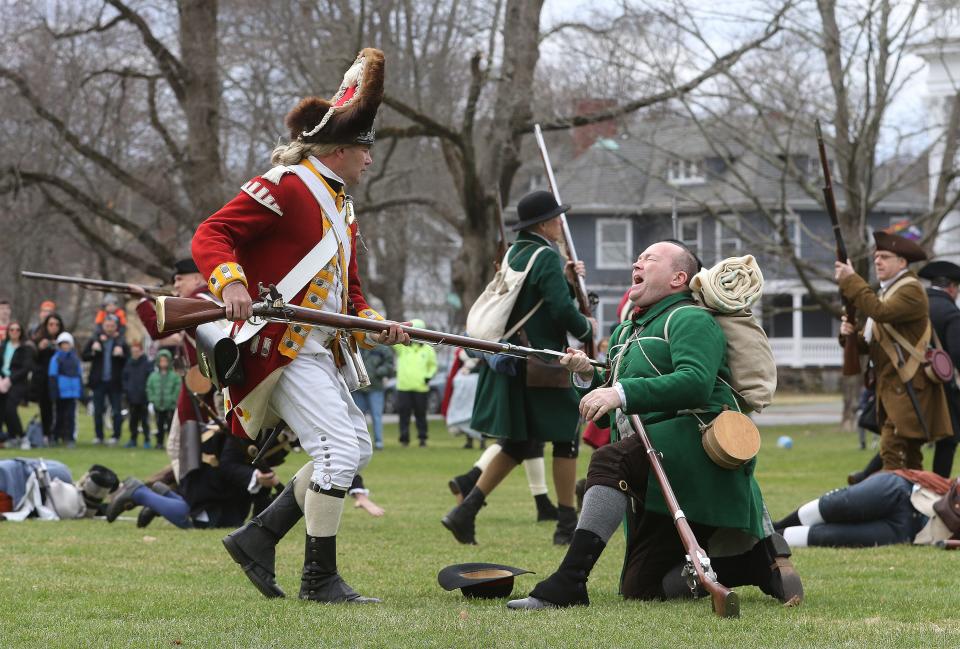 Alex Cain, as Jonas Parker, is bayonetted by British Regular Garrett Connelly during an April 3 rehearsal for this year's Patriots Day reenactment of the Battle of Lexington.