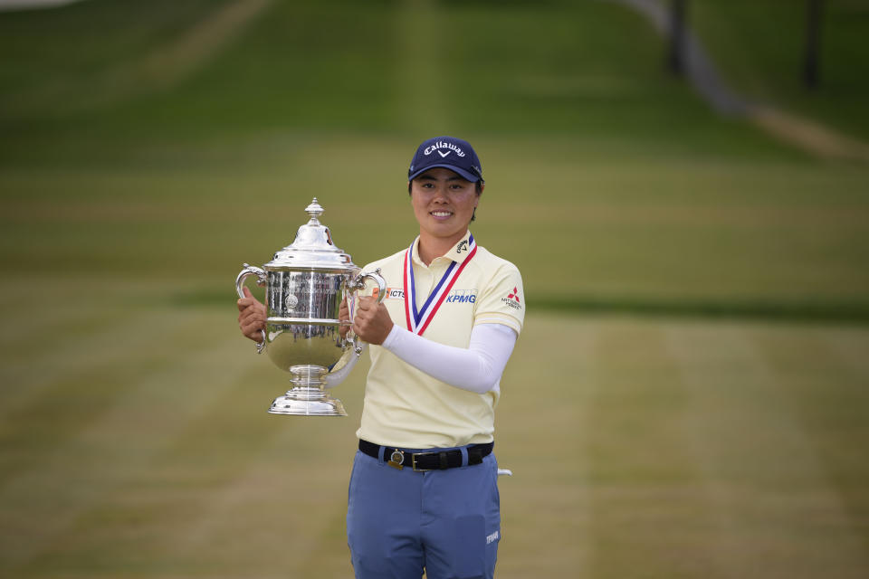 Yuka Saso, of Japan, holds the tournament trophy after winning the U.S. Women's Open golf tournament at Lancaster Country Club, Sunday, June 2, 2024, in Lancaster, Pa. (AP Photo/Matt Slocum)