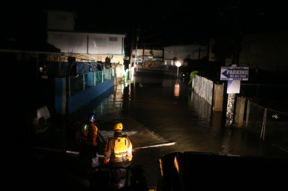 <p>A rescue team from the local emergency management agency inspects flooded areas after the passing of Hurricane Irma on Sept. 6, 2017 in Fajardo, Puerto Rico. (Photo: Jose Jimenez/Getty Images) </p>