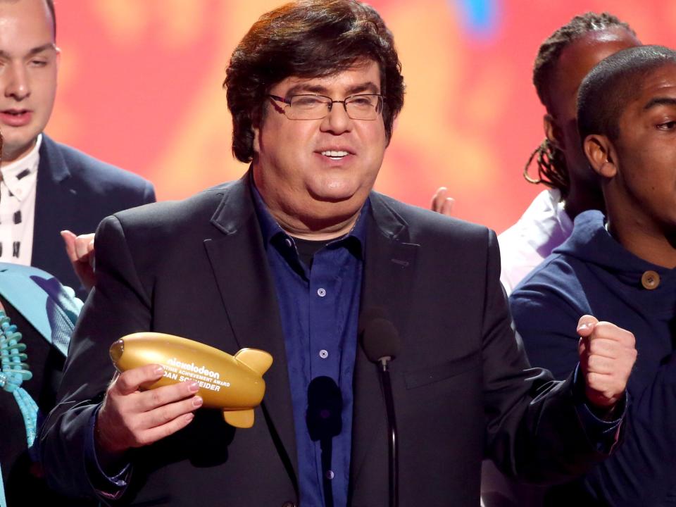 Dan Schneider accepts the lifetime achievement award at the 27th annual Kids' Choice Awards at the Galen Center on Saturday, March 29, 2014, in Los Angeles.