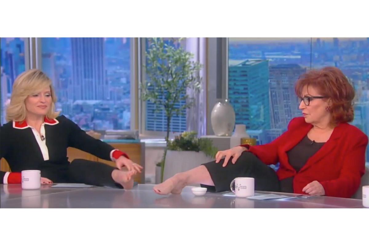 The View co-hosts Joy Behar, Sara Haines and Sunny Hostin compare their bare feet at the table