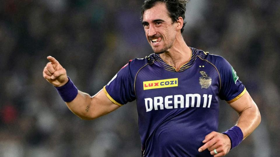 Mitchell Starc celebrates after taking the wicket of Sunrisers Hyderabad's Shahbaz Ahmed (Photo by Punit PARANJPE / AFP)