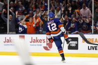 New York Islanders center Josh Bailey (12) celebrates his goal against the Tampa Bay Lightning in the second period of Game 4 of an NHL hockey Stanley Cup semifinal, Saturday, June 19, 2021, in Uniondale, N.Y. (AP Photo/Jim McIsaac)